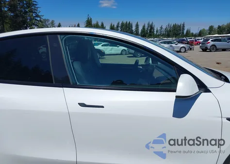 2023 Tesla Model Y Awd/Long Range Dual Motor All-Wheel Drive z USA, uszkodzony, nr VIN 7SAYGAEE1PF700262